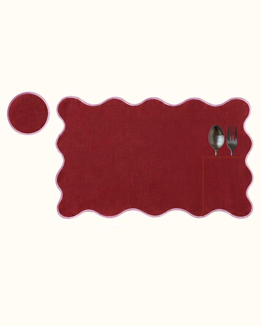 Cab Sauv linen set of eight, four placemats and four coasters in deep wine red piped in soft pink.