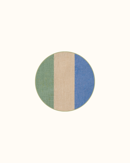 Four round linen coasters in EVOO, green through cream into blue, piped in olive.